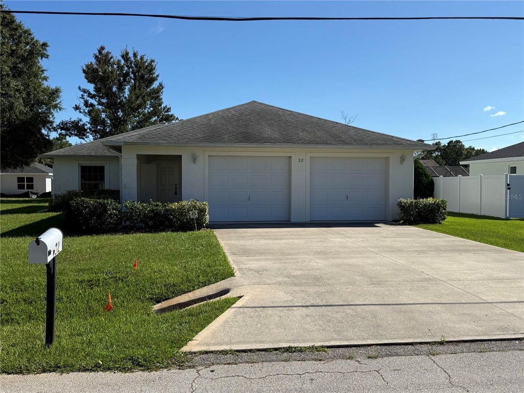 Photo of 32 Raeland Lane, Palm Coast, FL 32164 (MLS # FC321719)