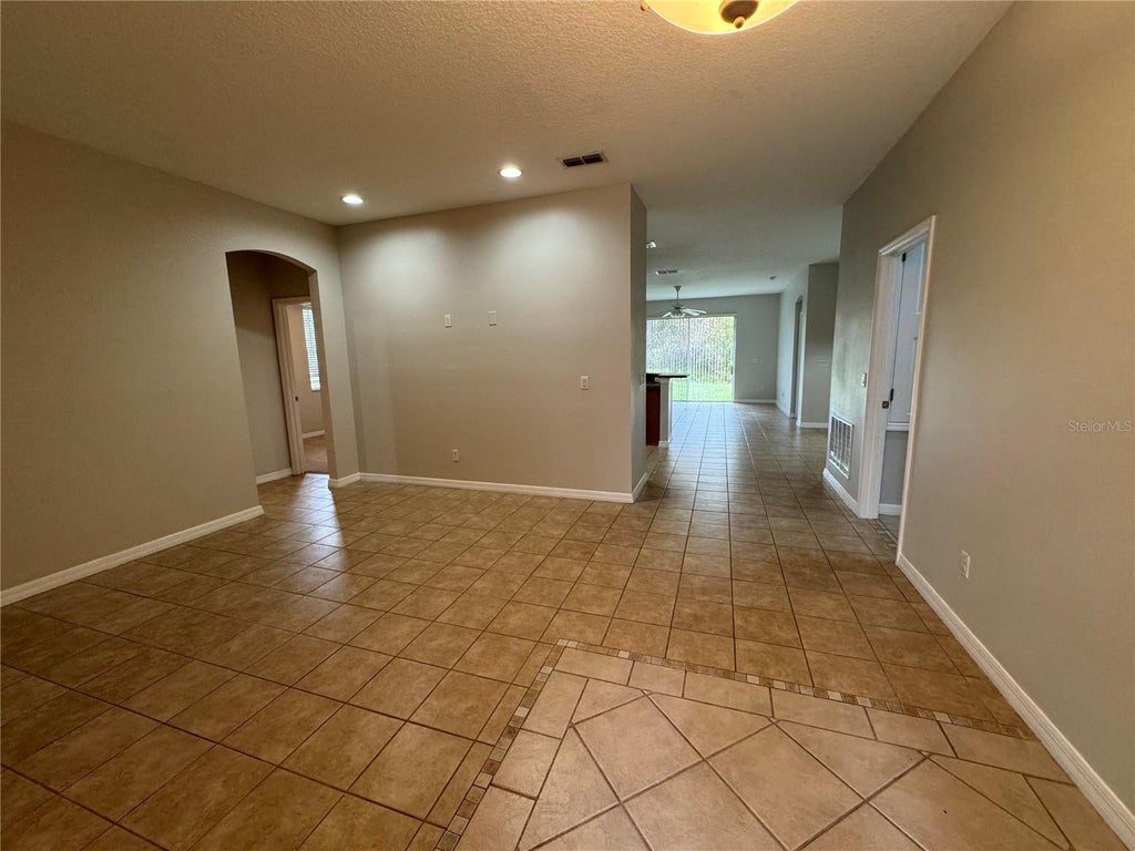 Photo of 10360 Sandy Marsh Lane, Orlando, FL 32832 (MLS # O6412683)