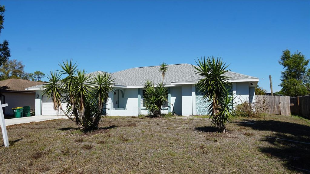 Photo of 23268 Avacado Avenue, Port Charlotte, FL 33980 (MLS # O6385209)