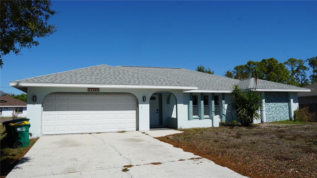 Photo of 23268 Avacado Avenue, Port Charlotte, FL 33980 (MLS # O6385209)