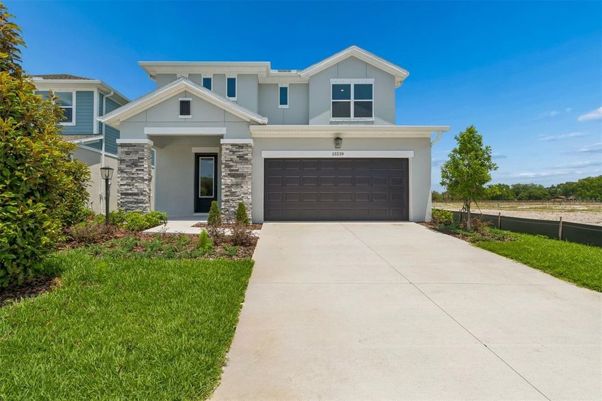Discover the Zander by David Weekley Homes at Eastlyn in Bradenton, FL,  Just ten minutes from I-75 and SR 64 you'll find a two-story home beautifully designed for you,  where modern elegance meets everyday functionality. With no CDD Fees and low-HOA, Eastlyn provides a peaceful setting that's close enough to the highway to be convenient, yet far enough away to avoid the big city traffic. Only a 4-minute drive from groceries, 10 minutes to the Costco/Target shopping center where you'll find a variety of stores and top restaurants. Easy access to Sarasota, St. Petersburg, and Tampa allow you to enjoy big city amenities when you want them and the serene relaxation when you don't. 

This spacious floor plan offers 4 bedrooms, 3.5 bathrooms, 2 car garage and a large upstairs retreat that can serve as a game room, home theater, or quiet reading nook and is backed by David Weekley Homes' comprehensive 1-2-10 warranty. 

The upgraded gourmet kitchen is a showstopper, featuring quartz countertops, a large walk-in pantry, and seamless flow into the open-concept dining and family areas. Outstanding use of windows and natural light in the atrium style main living area enhances the luxury throughout and adds an elegant feel. The Owner’s Retreat provides a private escape with a spa-inspired Super Shower, and a spacious walk-in closet. The flooring choices throughout are sure to please with durable laminate flooring running through the main living spaces, blending style with practicality and tile in the bathrooms and carpet in the bedrooms. An extended covered lanai with 12' sliders extends the living space outdoors, perfect for morning coffee or evening conversations under the Florida sky. **This property offers a limited-time interest rate incentive.