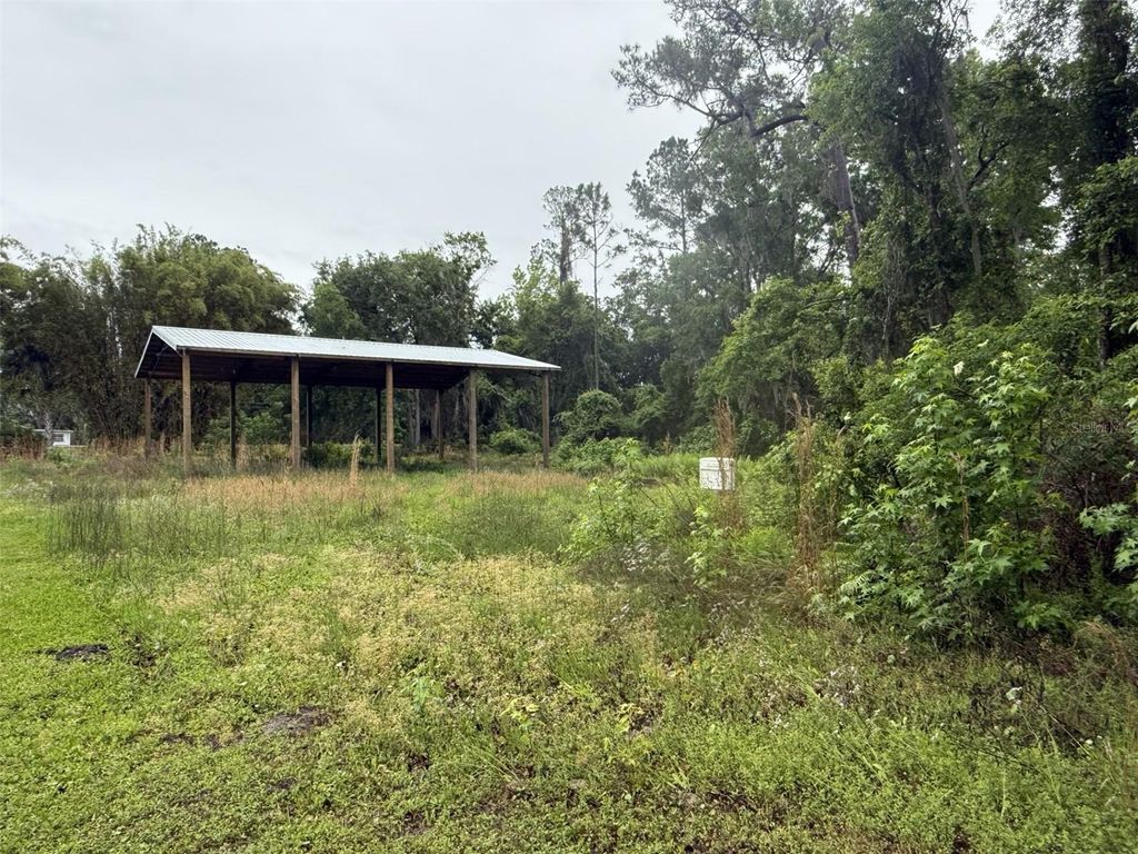 Photo of 218 Pine Drive, Crescent City, FL 32112 (MLS # GC539228)