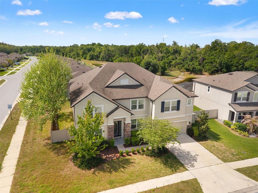 6 Bedrooms. Pool & Spa. 5,452 SF. The Biggest Floor Plan in Talavera -- and It Shows.

Need space for the whole family and room to entertain? Yeah, this one's got both.

This M/I Homes Renato model sits on an oversized CORNER LOT in Talavera and gives you 5,452 square feet to actually live in -- not just look at. Six BEDROOMS, 4 FULL BATHS, 2 HALF BATHS, a SALTWATER POOL with a HEATED JACUZZI SPILLOVER, a SCREENED LANAI, and a 3-CAR TANDEM GARAGE. 

Built in 2019, so everything still feels new.

The downstairs OWNER'S SUITE has direct POOL views, TWO WALK-IN CLOSETS with BUILT-IN SYSTEMS, and a spa-style bath with DUAL QUARTZ VANITIES, GARDEN TUB, and a GLASS-ENCLOSED SHOWER. 

The KITCHEN is the real deal -- QUARTZ COUNTERS, 42-INCH UPPER CABINETS, an OVERSIZED ISLAND, BUILT-IN OVEN, BUTLER'S PANTRY, and a WALK-IN PANTRY with CUSTOM SHELVING. 

There's also a PRIVATE GUEST SUITE downstairs with its own POOL ACCESS -- great for in-laws or guests who like their space.

Head upstairs and you've got an ENORMOUS GAME ROOM with a FULL WET BAR (yes, the POOL TABLE stays), a dedicated HOME THEATER with ALL EQUIPMENT INCLUDED, and four more BEDROOMS -- each with WALK-IN CLOSETS. Bedroom 6 works perfectly as a SECOND PRIMARY SUITE.

NO CARPET anywhere in this home. TWO LAUNDRY ROOMS (yes, one on each floor). TWO JACK-AND-JILL BATHS with QUARTZ VANITIES. PRE-PLUMBING for an OUTDOOR KITCHEN. GUTTERS throughout.

Talavera's amenities don't disappoint -- ZERO-ENTRY RESORT POOL, SPLASH PAD, CLUBHOUSE, TENNIS COURTS, BASKETBALL COURTS, and regular FOOD TRUCKS. Easy access to US-41, SR-52, and the SUNCOAST PARKWAY!

What would you do with 5,452 square feet? Come see it and decide.