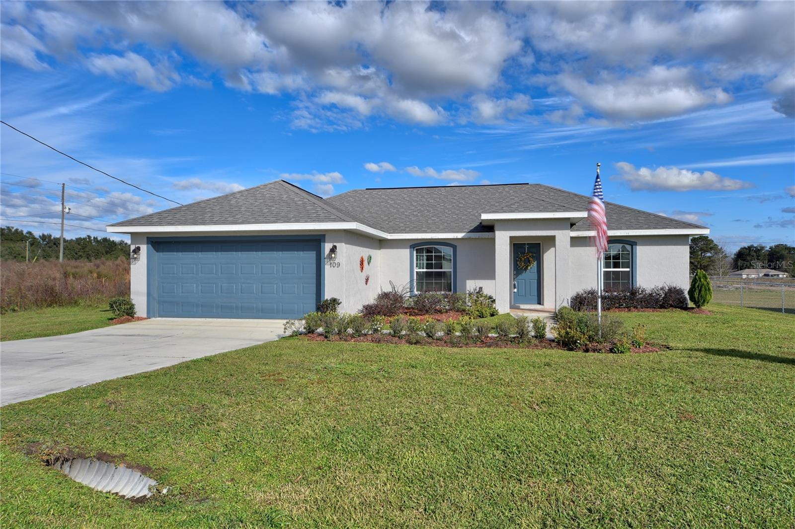Under Construction. BUILDER IS OFFERING A BUYER'S INCENTIVE OF $8,500 to buyer at closing. Funds can be used toward buyer's closing costs, to reduce loan amount or to reduce loan rate. Your choice!!
Come see this beautiful, award winning 3 bedroom / 2 bath home voted Best Value Overall! This new construction home offers a spacious split plan with cathedral ceilings in the living room and kitchen. Kitchen design features stainless appliances with stunning granite countertops to compliment the upgraded wood cabinetry featuring self-closing drawers and doors! You will enjoy entertaining in this kitchen with its eight-foot serving counter and French doors leading to attached, enclosed lanai! The master bedroom is spacious and features a walk-in closet with a custom tiled master bath and wood cabinetry with granite counters! Two car garage boasts painted interior, epoxy flooring, and two auto garage remotes. This home features upgraded plumbing and lighting fixtures as well as Luxury Vinyl Planking throughout with Carpet in Bedrooms, come standard. Block construction. Finally, you can rest assured with the 2-10 Home Buyer’s Warranty supplied by the Seller! **Any photos depicted are of our model home and are for illustration purposes only. Interior and exterior colors, as well as finishes may vary for actual home. Garage orientation may also vary.**