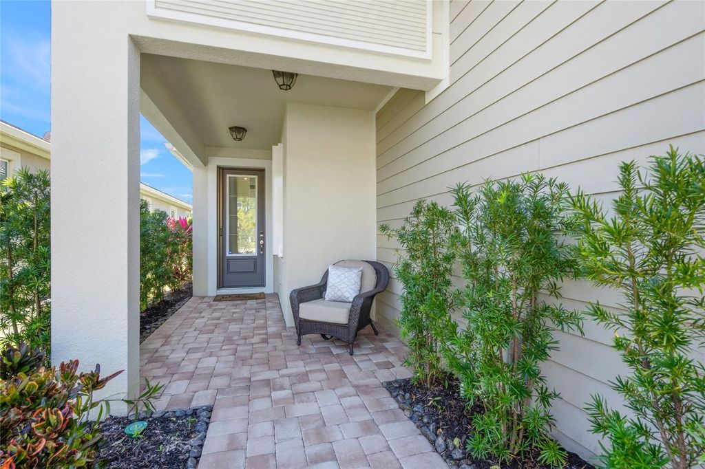 Photo of 8605 Rain Song Road, Sarasota, FL 34238 (MLS # A4678947)