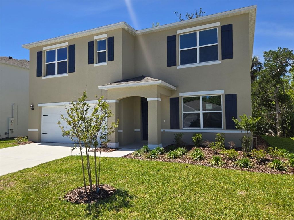 Photo of 508 Coronado Cove Road, New Smyrna Beach, FL 32168 (MLS # O6372075)
