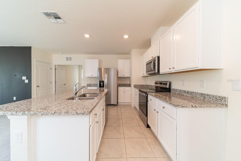 Photo of 1181 Cascades Avenue, Davenport, FL 33837 (MLS # O6354889)