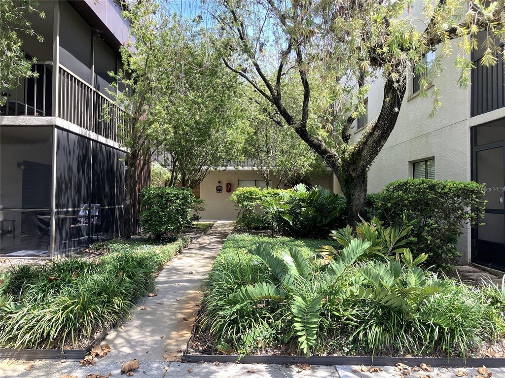 Photo of 11703 Raintree Village Boulevard #B, Temple Terrace, FL 33617 (MLS # TB8558600)