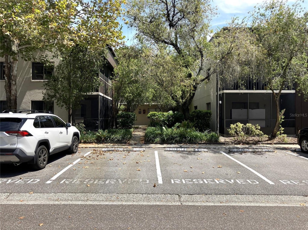 Photo of 11703 Raintree Village Boulevard #B, Temple Terrace, FL 33617 (MLS # TB8558600)