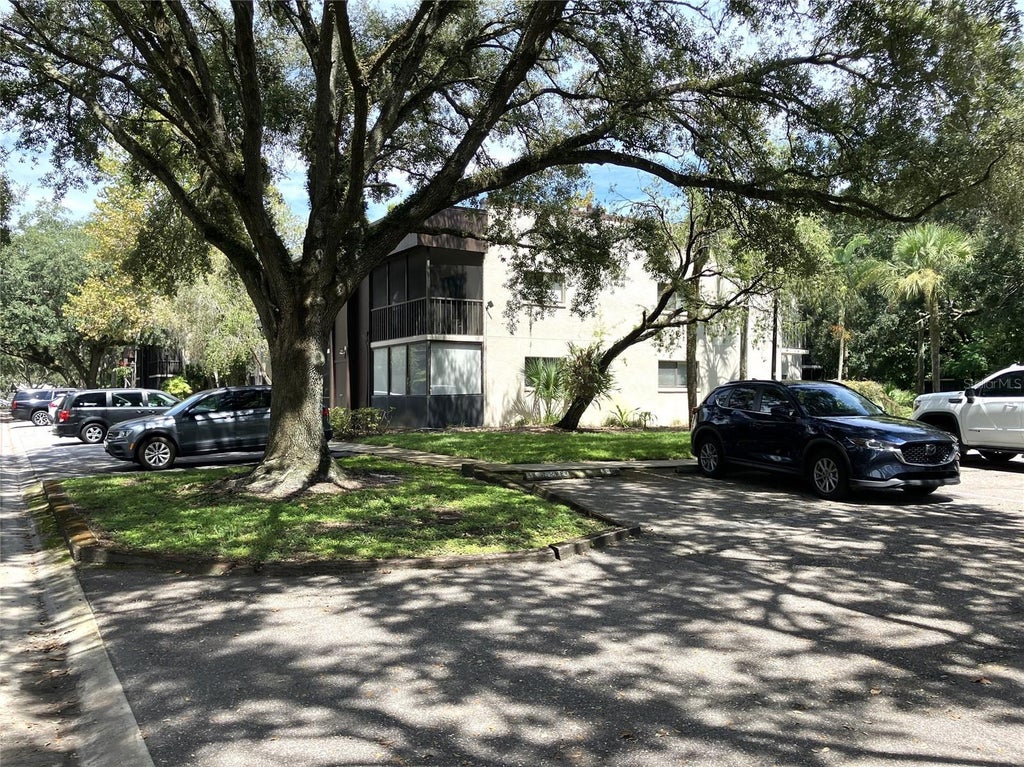 Photo of 11703 Raintree Village Boulevard #B, Temple Terrace, FL 33617 (MLS # TB8558600)
