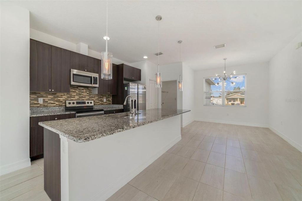 Photo of 212 Grouper Court, Poinciana, FL 34759 (MLS # O6371130)