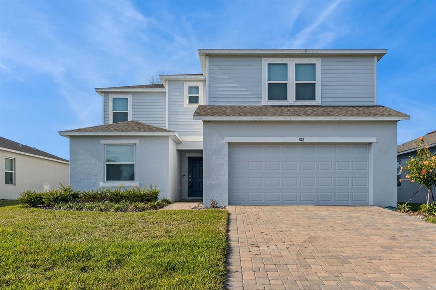 Welcome to 188 Jones Fish Camp Rd., a charming recent new construction home that boasts 2,673 square feet of living space to include five spacious bedrooms and three full baths, an open concept living, dining and kitchen area with all the conveniences needed in a home. As you enter the home you are greeted by an entry that leads to an open living, dining and kitchen space with lots of natural light. The kitchen is equipped with stainless steel appliances, a generous pantry, white shaker cabinets and a center island perfect for friend and family gatherings. The home has a guest suite and a full bathroom on the first floor with the primary suite and three additional bedrooms and two full baths on the second floor plus a large family room. All bedrooms feature window blinds for privacy. Flooring includes carpeting upstairs and all bedrooms and ceramic tile downstairs and all wet spaces. The primary bedroom on the second floor has a walk-in closet and access to the en-suite bathroom with double vanity and shower insert. The upstairs guest bedrooms are generously sized and are accessible to the guest bathroom with a double vanity and a tub/shower combo. The upstairs laundry room provides a washer and dryer for tenant convenience. The front of the home has a covered front door entry, a 2 car garage and in the back is a covered porch with a water view. For your additional enjoyment the Riverfront community offers easy access to local shops, dining, Florida's beautiful beaches and endless recreational activities. Whether you're looking to explore the nearby coast or enjoy a quiet evening at home, 188 Jones Fish Camp Rd. is the perfect backdrop for your next chapter. Tenant requirements are as follows and are subject to change at any time within applicable Florida landlord-tenant law: minimum gross household income of 3x the monthly rent amount, a favorable background and credit screening, favorable rental history and references, proof of income/employment. A Holding Fee (same as rent) is due upon applicant approval (within 24 hours) to mark listing as Pending. First month's rent and last month's rent are due 14 days prior to lease start date. The owner does not allow smoking in or around the home. A small dog may be considered on a case by case basis and a non-refundable pet fee + monthly pet rent may be required. Lawn care is included. Tenants are required to provide proof of renter's insurance and are responsible to pay all utilities and put in their name. Lease agreements are drafted by an attorney and are non-negotiable. The Holding Fee is refundable until the lease agreement is signed, at which time it becomes non-refundable until vacancy, as provided in the lease terms. Please review these requirements BEFORE requesting a showing. After viewing, listing agent will provide application link, upon request. Each adult over age 18 must apply. Application fee is $100 per applicant. If a tenant-prospect chooses to apply for one of our rental properties, that DOES NOT guarantee that the prospect's application will be approved. The application fee is NON-REFUNDABLE. Tenant approval is contingent on a lease start date within 30 days of application.