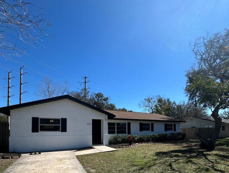 A rare and powerful opportunity in the heart of Oviedo—this sprawling 6-bedroom, 4-bath ranch-style home sits on an oversized corner lot and delivers flexibility, space, and income potential that is almost impossible to find at this price point. With nearly 2,700 square feet of heated living space, the layout offers true multi-generational appeal, featuring a split floor plan, a beautifully updated kitchen with granite countertops and stainless steel appliances, a cozy wood-burning fireplace anchoring the living space, and a massive Florida room perfect for entertaining, relaxing, or expanding your indoor-outdoor lifestyle. The expansive yard provides ample room for RV or boat parking and even future pool possibilities, while the block construction and recent updates throughout make this property move-in ready. Adding exceptional value, the detached guest house/studio offers strong rental income potential with current rents generating approximately $2,900 monthly combined, making this an ideal option for owner-occupants, investors, or those seeking supplemental income. No HOA, prime Seminole County schools, close proximity to UCF, shopping, dining, and downtown Oviedo—this property checks boxes most homes simply cannot. A standout opportunity with size, income, and location all in one compelling package.