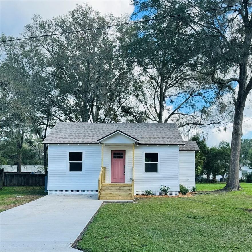 Another fine home, offered by Rubio Group Homes, is just waiting for it's new owners!  This recently updated (2) bedroom, (1) bath home has been filled with quality finishes and is ready to make your dream of home ownership a reality. Step inside and be captivated by the luxury vinyl plank flooring underfoot, freshly painted walls and new lighting fixtures adorning the space. The kitchen offers white cabinetry, quartz counters, new stainless steel appliances and also a new washer & dryer. This home has been totally renovated from top to bottom including a new roof, plumbing, electrical, tankless hot water heater and HVAC. Enjoy the 12' x 20' deck overlooking the backyard. Picture yourself hosting BBQs, all while taking in the fresh air and enjoying the fabulous Florida lifestyle. Access nearby restaurants, shopping, schools, and medical facilities, all while enjoying your privacy - the best of both worlds! Unlock the door to your future in Williston!