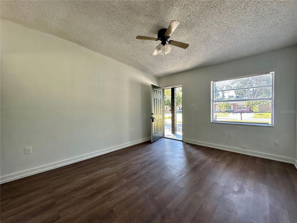 Photo of 5217 Montague Place, Orlando, FL 32808 (MLS # OM711688)