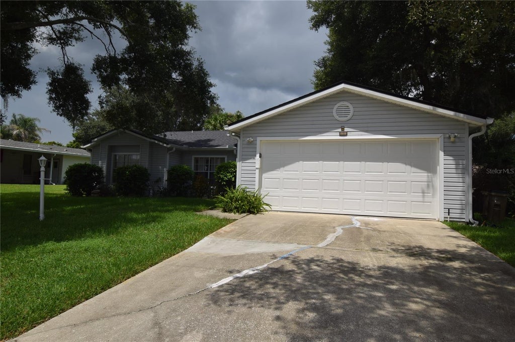 Photo of 5137 Desoto Way, Leesburg, FL 34748 (MLS # O6435619)
