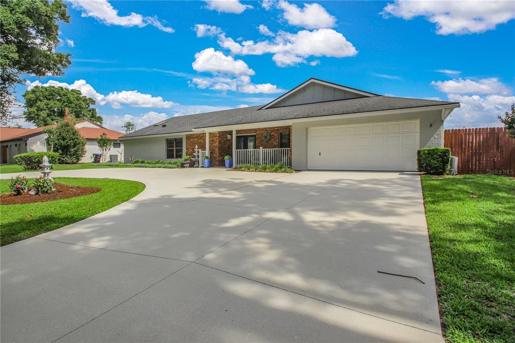 Photo of 7243 Woodville Crescent, Orlando, FL 32819 (MLS # O6413809)