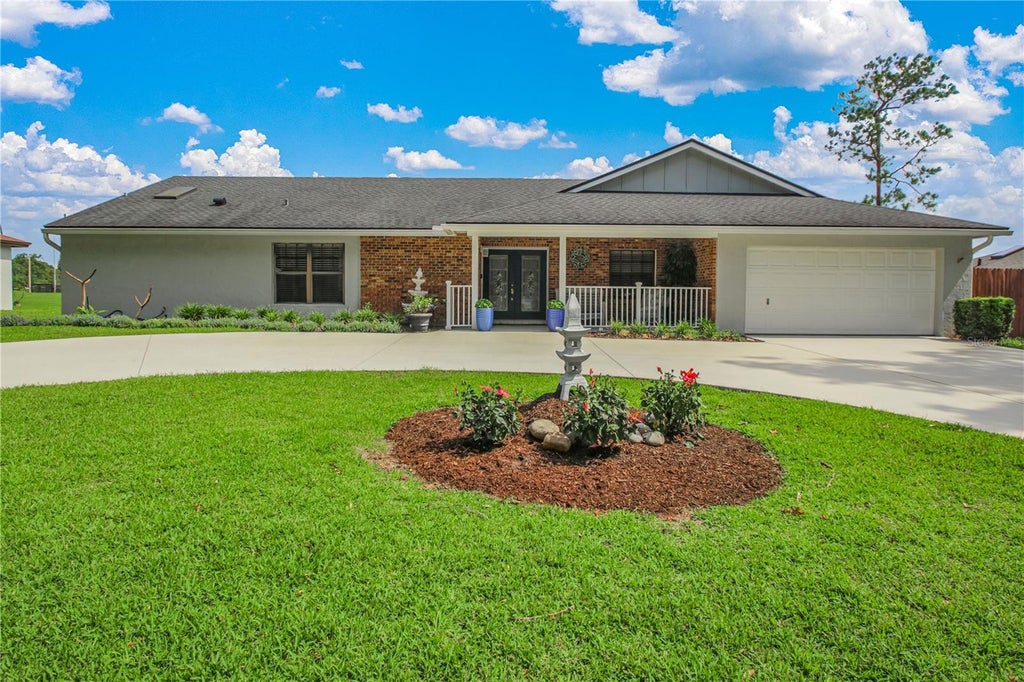 Photo of 7243 Woodville Crescent, Orlando, FL 32819 (MLS # O6413809)