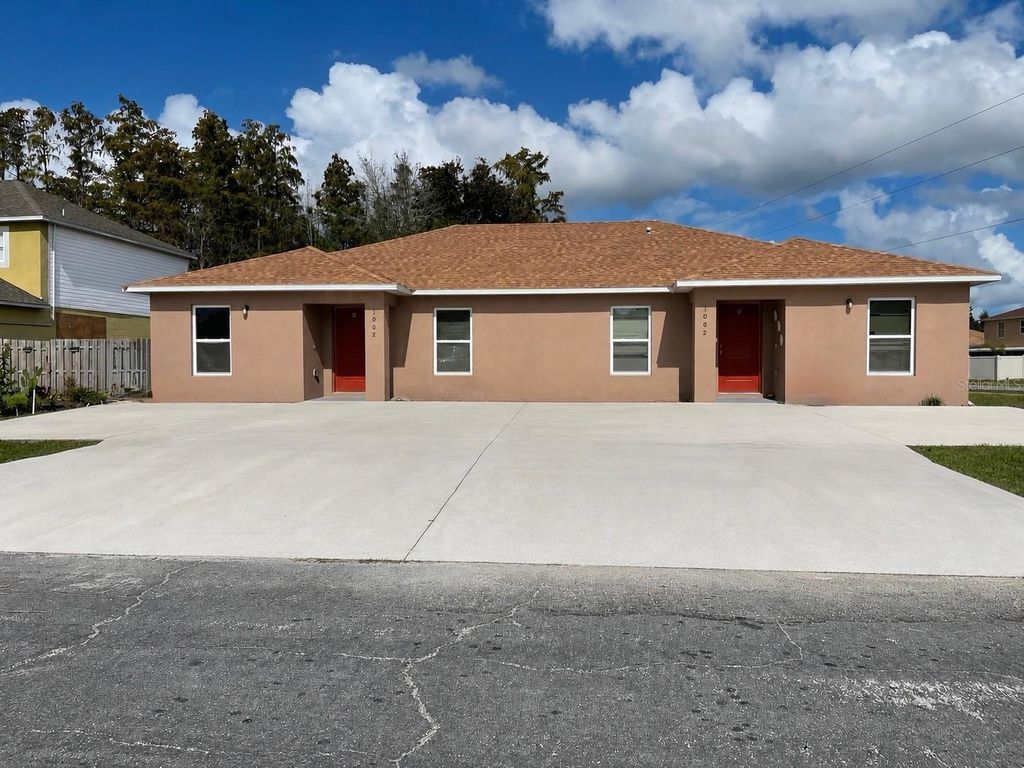 Photo of 1002 Mayfair Place, Kissimmee, FL 34758 (MLS # O6423219)