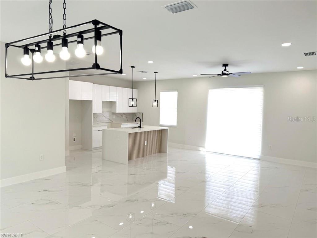 LEHIGH ACRES UNIT 3 BLK 31 PB 20 PG 23 LOT 12 - Residential