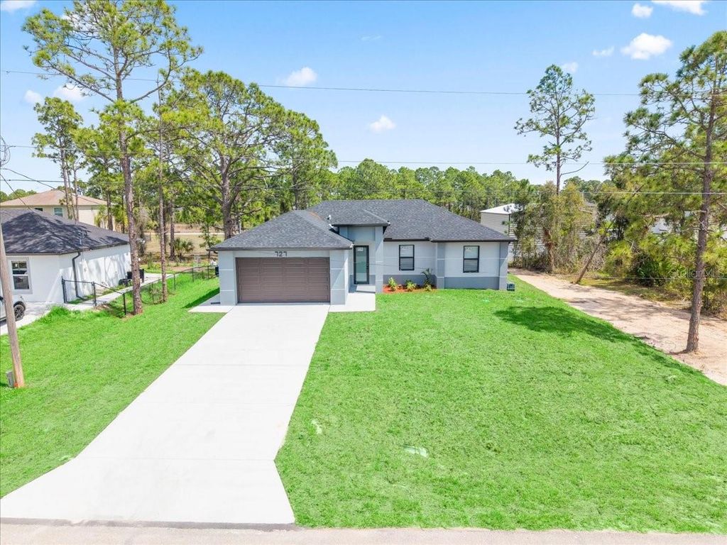 Photo of 727 Drury Avenue, Lehigh Acres, FL 33974 (MLS # A4685774)