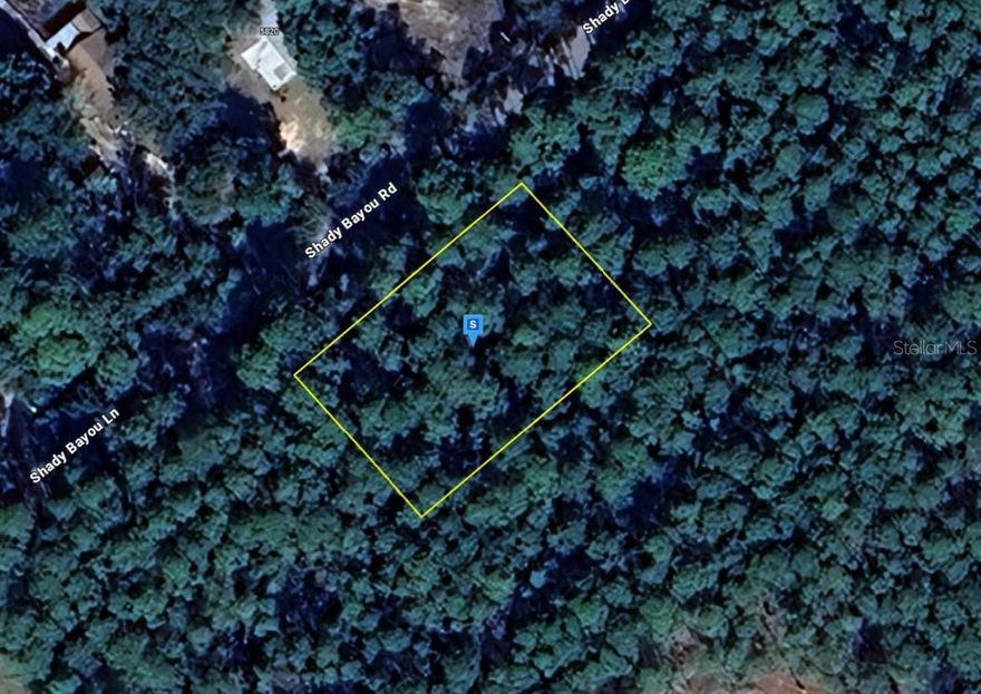 This vacant lot offers an excellent opportunity to build your future home or make a smart investment. Situated in Trout Bayou, the property features 0.33 acres with wooded terrain. Public water is available and septic is required. Enjoy a peaceful setting while remaining conveniently located near shopping, dining, schools, and major highways, providing easy access to city amenities. Whether you’re looking for a private retreat, a development opportunity, or a long-term investment, this lot provides the flexibility and location to suit your needs. Listing is for land only and comes As Is. Street addresses can be for listing purposes only and vacant land will receive a true street address once improved.