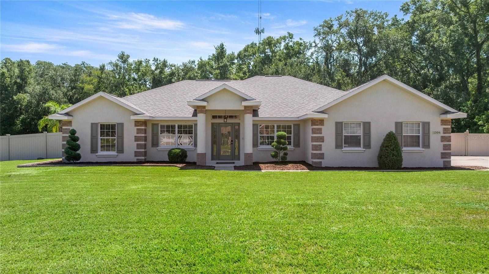 Welcome to this beautifully maintained home in the desirable Summerbrooke community! Offering over 2,000 square feet of living space, this 3-bedroom, 2-bath residence sits on a sprawling half-acre homesite, providing both comfort and room to grow. Step inside to find a bright, open layout with spacious living areas designed for both everyday living and entertaining. The well-appointed kitchen flows seamlessly into the dining and family rooms. The generous primary suite features a private bath and ample closet space, creating a relaxing retreat. Outside, the expansive yard offers endless possibilities—whether you envision a pool, garden, or simply a place to enjoy gatherings under the Florida sunshine. With mature landscaping, curb appeal, and a prime location in a sought-after neighborhood, this home truly combines space, style, and convenience.