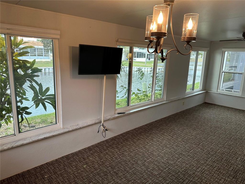 Photo of 200 Portree Drive, Dunedin, FL 34698 (MLS # TB8459977)