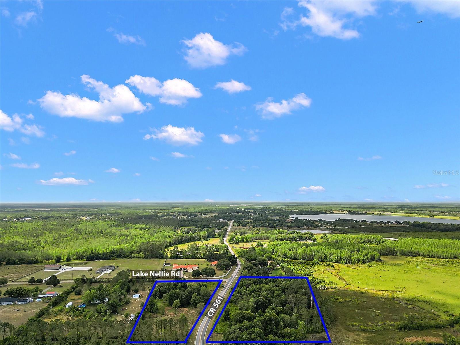 County Road 561 splits this parcel into two unequal halves with two road frontages of 665 feet on the western side and 509 feet on the eastern side. Verify with Lake County for a possible two lot split. Measurements and aerial boundary lines are approximate and should be verified.