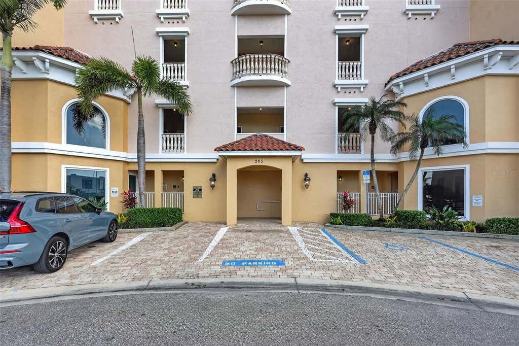 Photo of 205 Brightwater Drive #202, Clearwater Beach, FL 33767 (MLS # TB8536900)