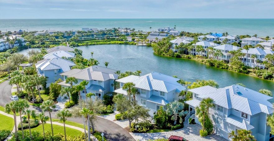 Supreme location and magnificently renovated Boca Bay Kentia property.  Situated out over the lakefront with a desirable southwest exposure, enjoy panoramic lake views and breathtaking sunsets over the Gulf of Mexico that you can see in the distance.  The pristine, move-in ready property has been meticulously maintained and the interior has been completely renovated by Safety Harbor Builders, including a highly customized kitchen, new bathrooms, added and re-finished solid wood flooring and carpeting, and enclosed lanai.  The stunning kitchen remodel encompassed raising the ceiling, built-in Subzero refrigerator, Bosch dishwasher, and premium Wood Mode cabinetry with maximum storage design.  It has a brand new metal roof and the air conditioner is about four years old.  All of the stairs, railings and decking have been replaced with composite materials. Its just a short stroll to the impressive bay front pool, small beach for kayak or paddle board launching and a massive fishing pier with a large stocked bait well.   The main Pass Club facilities are an easy walk across the picturesque gazebo bridge.  Or take your golf cart on a short scenic ride into town while enjoying gorgeous views of Charlotte Harbor. Boca Bay offers unparalleled amenities and services including the spectacular Gulf front Pass Club restaurant which was completely renovated in 2021, tennis and fitness center with 7 clay courts, locker room, sauna, four swimming pools, temporary boat dockage, nearly 2 miles of Boca Grande property lushly landscaped with biking and walking paths.