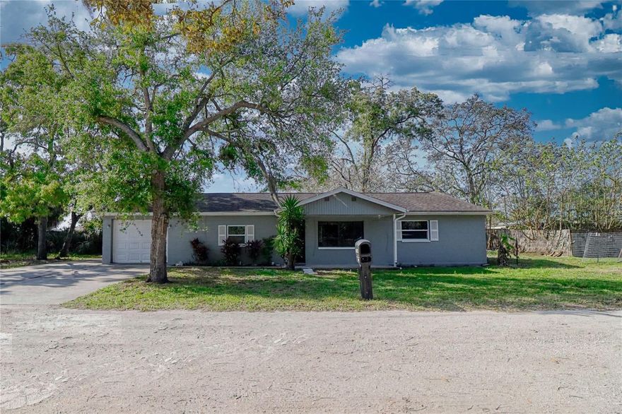 Welcome to your 3-bedroom |1.5-bathroom single-family block home that is conveniently just off the main roads with privacy away along a quiet street in Hudson. This home has a large double driveway that will give plenty of space for parking as well as space for an RV or boat, and additional space on either side of the home for even more toys or a farmer's garden if you're so inclined to grow your own. This home has beautiful updated flooring in the living room, fresh paint on every wall in the home, and brand new ceiling fans! Many more updates throughout this home. The home features a super oversized one-car garage with a workshop inside, providing ample space for hobbies and projects or work space. The garage also houses a convenient half bathroom, presenting a promising opportunity to create a functional and versatile space. The potential in this additional bathroom space allows for various uses, enhancing the overall value of the property. This home has a great zoning, which is SINGLE FAMILY (RURAL ACREAGE 20-) (0110) Zoning: AR/AGRICULTURAL SFR/MH Schedule your private showing TODAY!