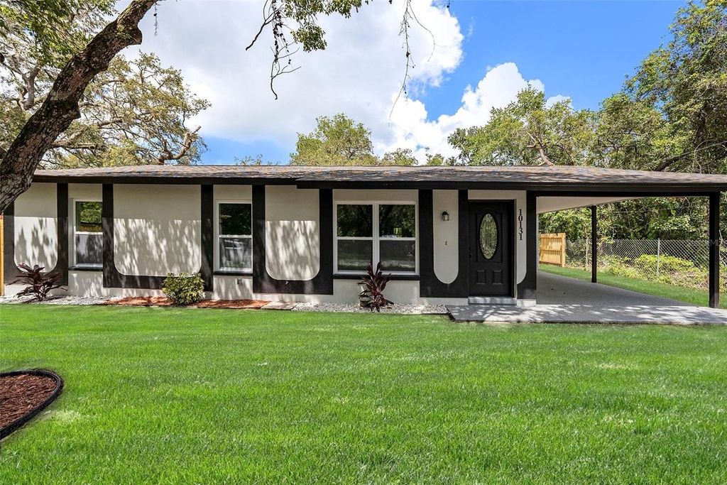 Photo of 10131 Field Street, New Port Richey, FL 34654 (MLS # TB8418349)