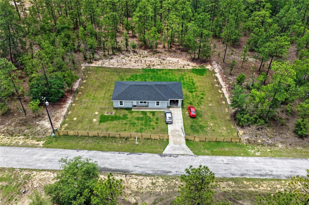Photo of 452 NW Crocus Lane, Dunnellon, FL 34431 (MLS # O6409484)