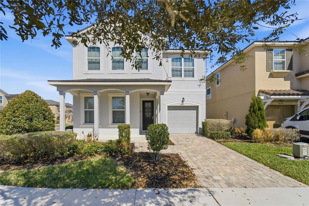 Photo of 9013 Egret Mills Terrace, Kissimmee, FL 34747 (MLS # O6385765)