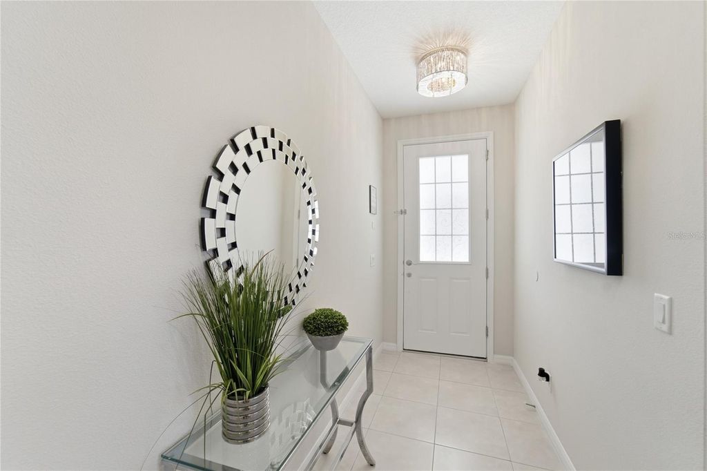 Photo of 9013 Egret Mills Terrace, Kissimmee, FL 34747 (MLS # O6385765)