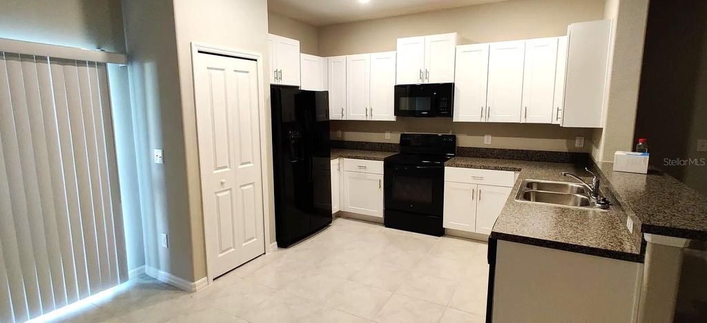 Photo of 4505 Globe Thistle Drive, Tampa, FL 33619 (MLS # TB8389315)