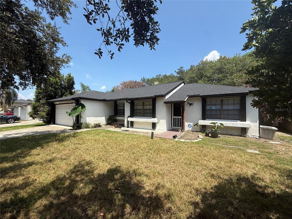 Photo of 113 S Deerwood Avenue, Orlando, FL 32825 (MLS # O6448235)