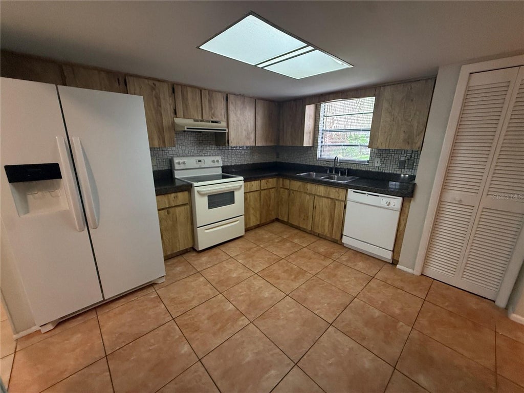 Photo of 113 S Deerwood Avenue, Orlando, FL 32825 (MLS # O6448235)