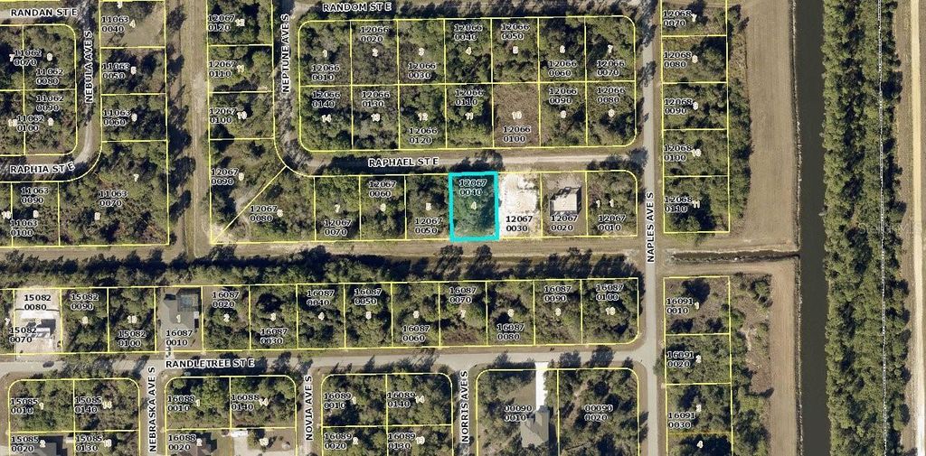 Photo of 1240 Raphael Street E, Lehigh Acres, FL 33974 (MLS # GC542010)