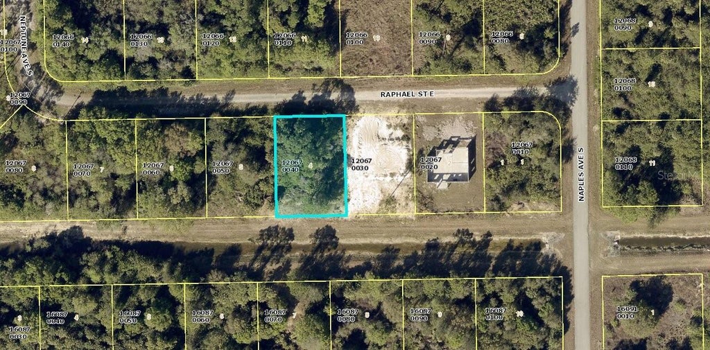 Photo of 1240 Raphael Street E, Lehigh Acres, FL 33974 (MLS # GC542010)