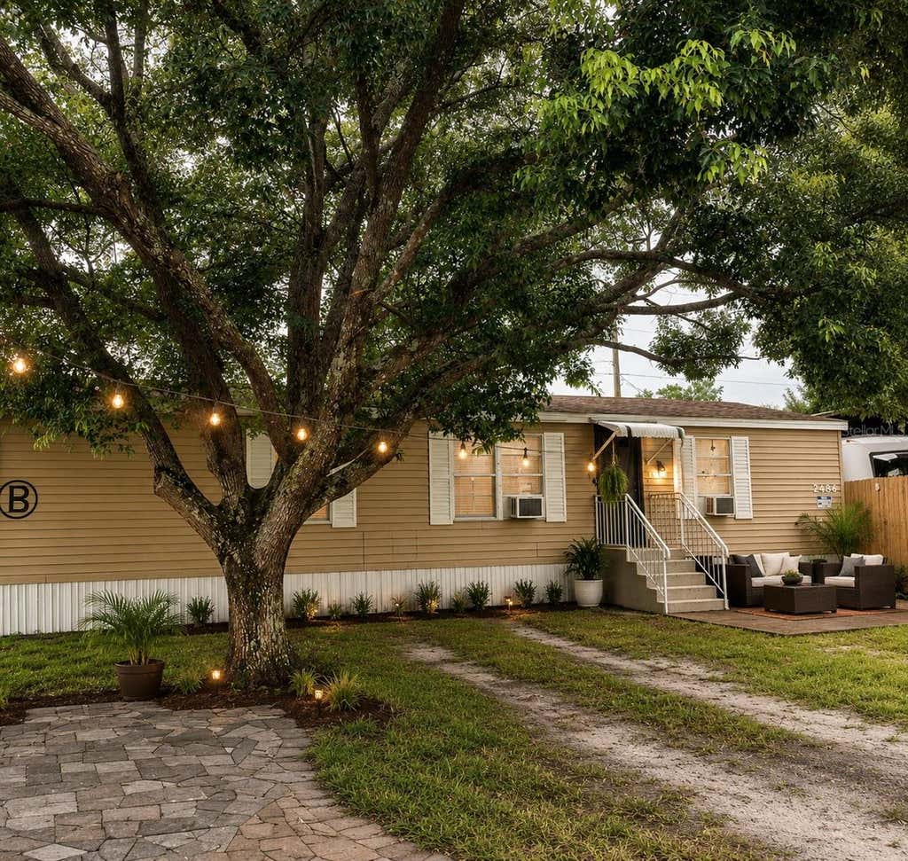 Photo of 7494 Charlin Parkway, Orlando, FL 32822 (MLS # TB8541505)