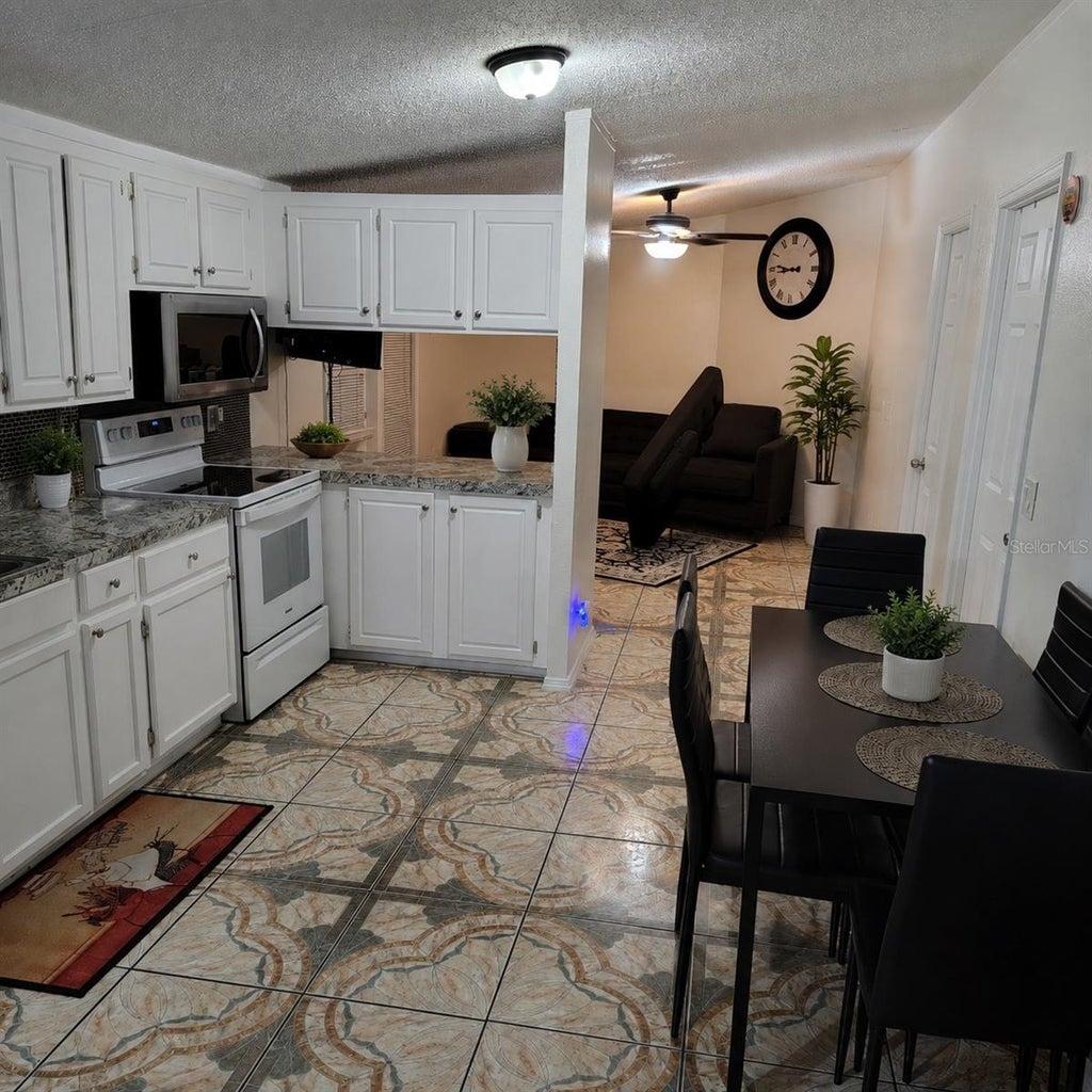 Photo of 7494 Charlin Parkway, Orlando, FL 32822 (MLS # TB8541505)