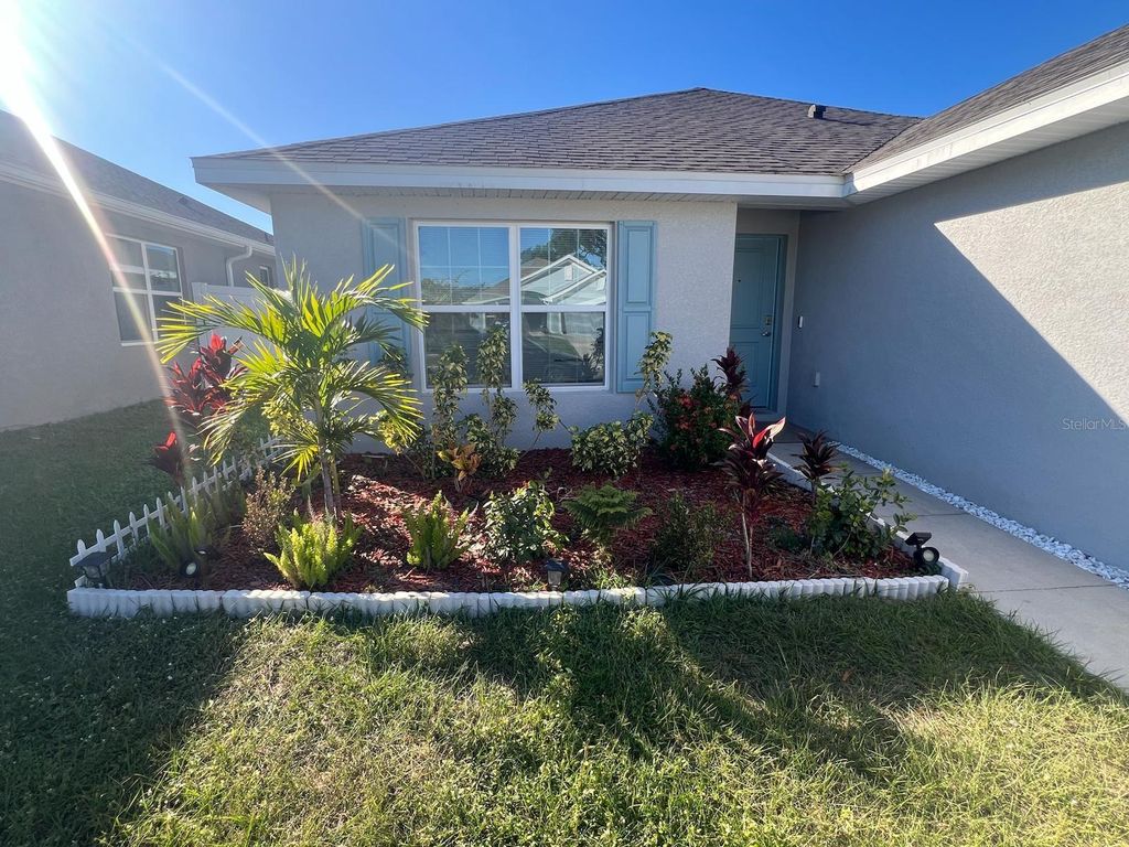 Photo of 239 Krenson Bay Loop, Winter Haven, FL 33881 (MLS # P4937051)