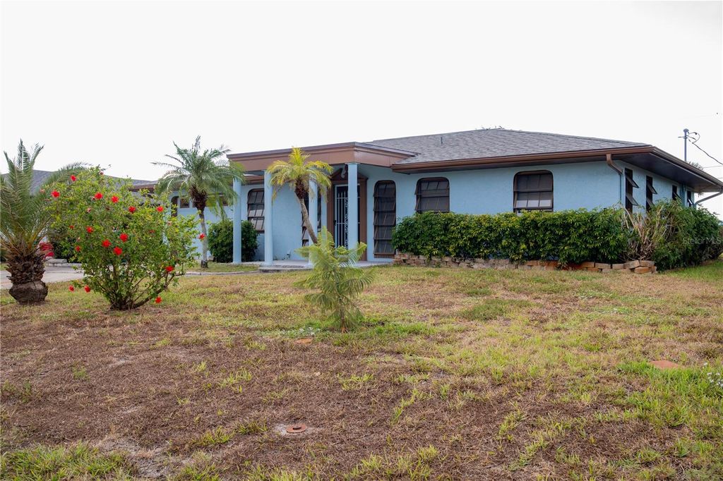 Photo of 128 Bedford Drive NE, Port Charlotte, FL 33952 (MLS # A4670809)