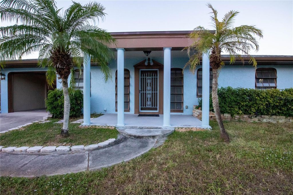 Photo of 128 Bedford Drive NE, Port Charlotte, FL 33952 (MLS # A4670809)