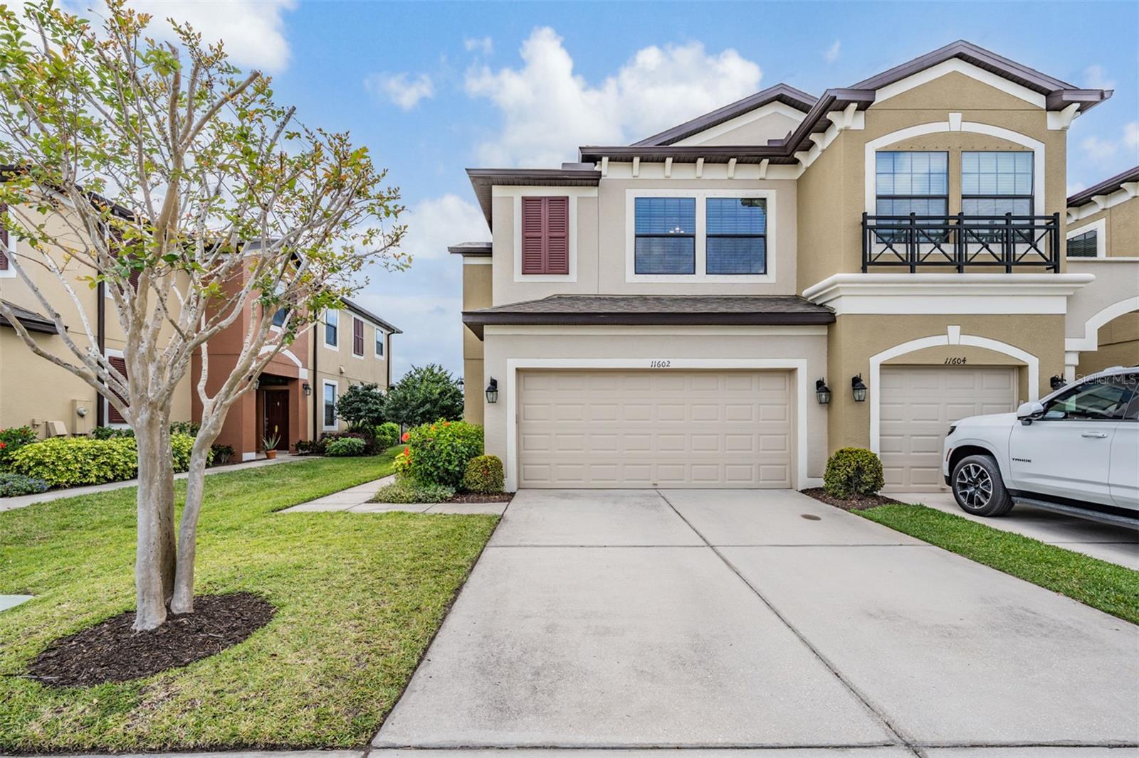 **NEW PRICE DROP!!** Spacious 3-bed, 2.5-bath corner-unit townhouse in the sought-after Townhomes of West Lake! Brand new HVAC system as of 7/5/25 and fresh paint in the guest bedrooms! This home features an open floor plan, a loft, and a 2-car garage. The chef’s kitchen boasts 42-inch cabinets, stainless steel appliances, a walk-in pantry with custom shelving, a wet bar, and an oversized island with granite countertops—perfect for entertaining.
Enjoy extra yard space, more natural light, and an additional parking spot thanks to the end-unit location. The first floor includes indoor laundry with custom shelving and a screened patio. Upstairs, the loft is ideal for an office or playroom, leading to a full bath. The primary suite offers a custom walk-in closet, dual vanities, a water closet, and a glass-enclosed shower. Two additional bedrooms feature walk-in closets, one with a Murphy bed, allowing it to double as office space with a granite top desk that conveys.
Upgrades include hurricane shutters, wood flooring, upgraded lighting, and a reverse osmosis water system. The gated, pet-friendly community offers a pool, clubhouse, and seasonal events. HOA covers water, sewer and grounds maintenance. Located in Westchase, just minutes from Citrus Park Mall, top dining, trails, medical clinics, emergency care, and Veterans Expressway for easy access to Tampa Airport, downtown, and beaches.