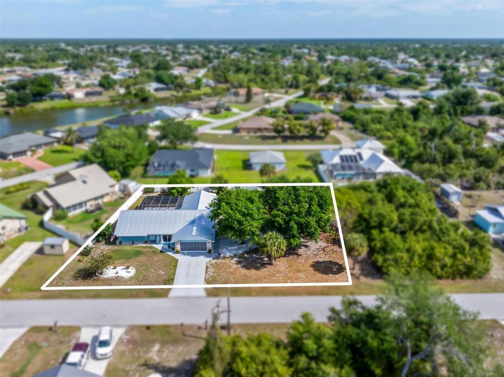 Photo of 10104 Rafferty Avenue, Englewood, FL 34224 (MLS # C7524016)