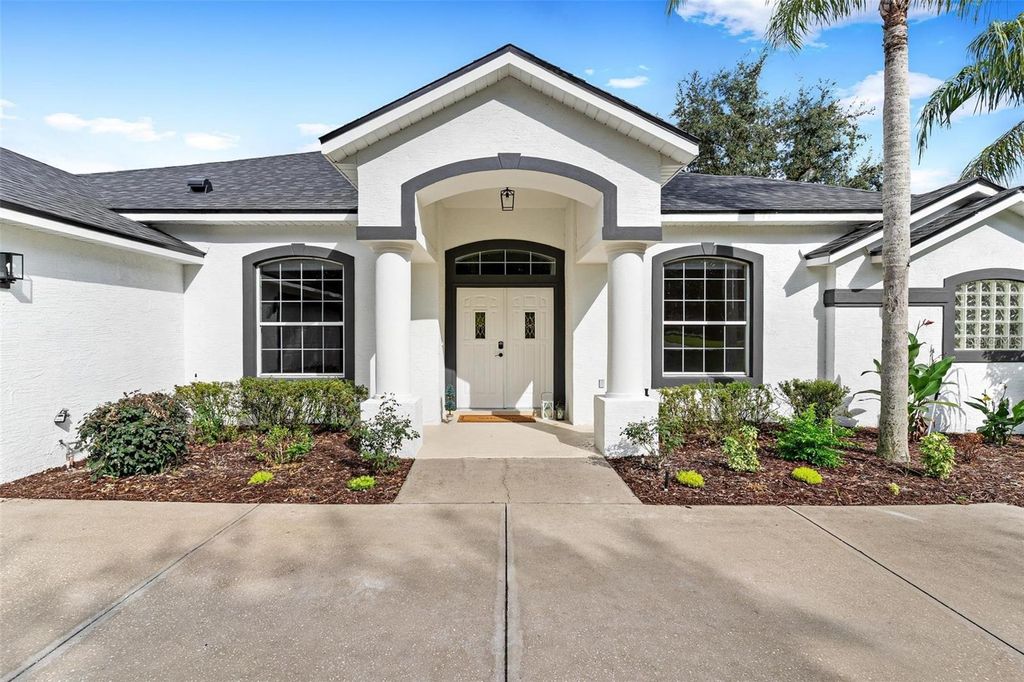 Photo of 39634 Harbor Hills Boulevard, Lady Lake, FL 32159 (MLS # O6391124)