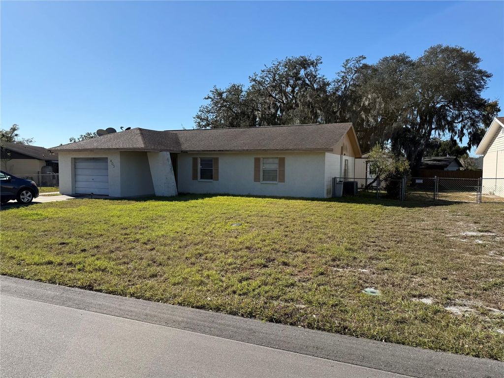 Photo of 405 Hickory Lane, Winter Haven, FL 33880 (MLS # P4937388)